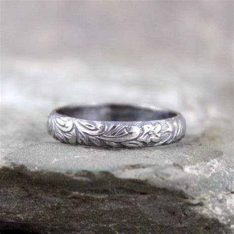 Use a single color with a contrasting color for the edging to give 6. Rustic Floral Pattern Sterling Silver Band Wedding Bands ...