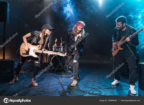 Rock Band On Stage — Stock Photo © Tarasmalyarevich 150804630