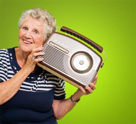 Senior Woman Listening Music Stock Photo By © 12666832