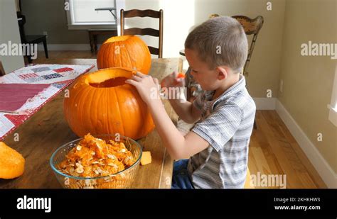 Kids Carve Pumpkins Stock Videos And Footage Hd And 4k Video Clips Alamy