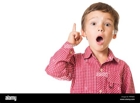 Young Adorable Boy Surprised With Finger Pointing Upwards Isolated On