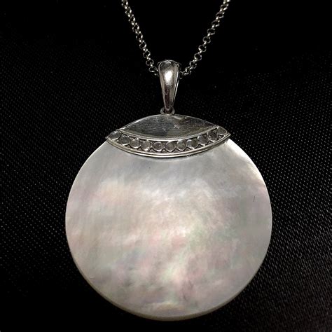 Sterling Silver Mother Of Pearl Medallion Pendant With Chain Property
