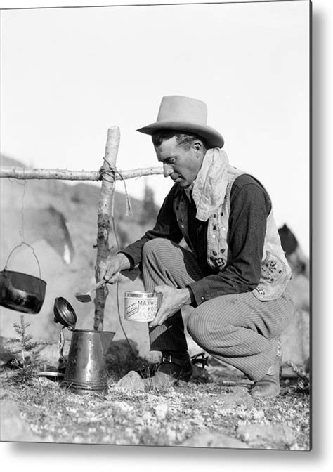 Cowboy Kneeling By Campfire Pouring Metal Print By H Armstrong
