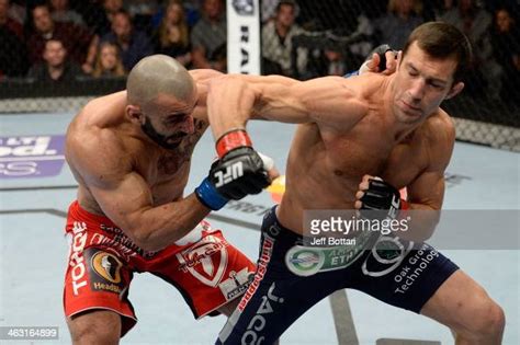 Luke Rockhold Punches Costas Philippou In Their Middleweight Fight