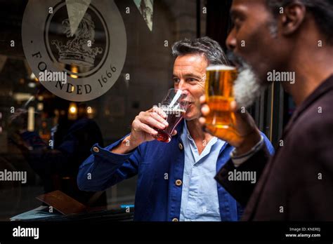Two Men Drinking Beer Outside Pub Hi Res Stock Photography And Images