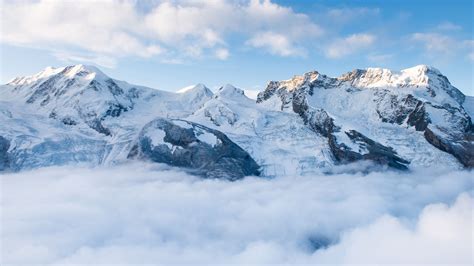 Download Wallpaper 2560x1440 Mountains Summit Snow Clouds Widescreen