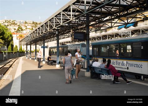 Passengers Waiting For A Train In The Chemins De Fer De Provence