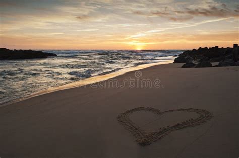 Heart Drawn In The Sand On The Beach At Sunset Stock Image Image Of