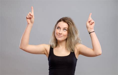 Beautiful Young Woman Pointing To Somewhere Stock Photo Image Of Lady