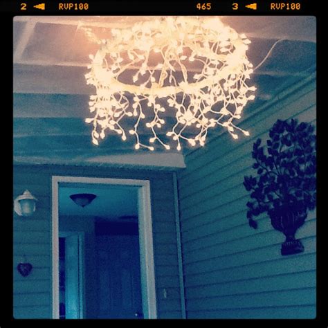Diy Hula Hoop Chandelier Wrapped With Light Garland For A Dreamy
