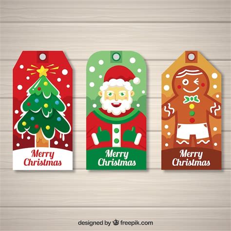 Set De Tres Etiquetas De Navidad Vector Gratis