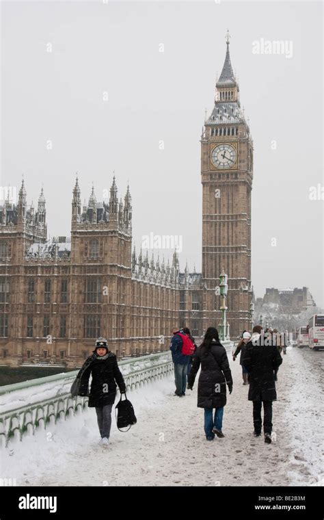 Tourists Walk Through Heavy Snow On Westminster Bridge Near Big Ben