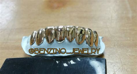 The molding cycle for real gold grillz can require weeks. Pictures - Benzino Jewelry & Gold Grillz