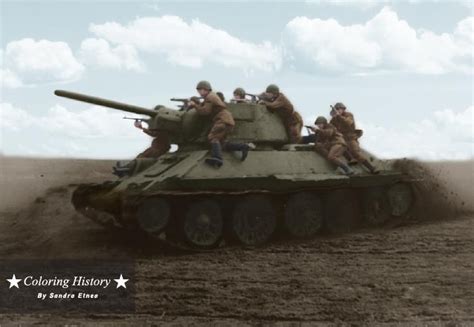Russian Soldiers Riding To Battle On A T 34 Tank During The Battle Of