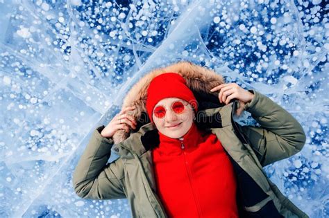 Travel Winter Lake Baikal Happy Joy Woman Tourist Lie On Ice Sunset