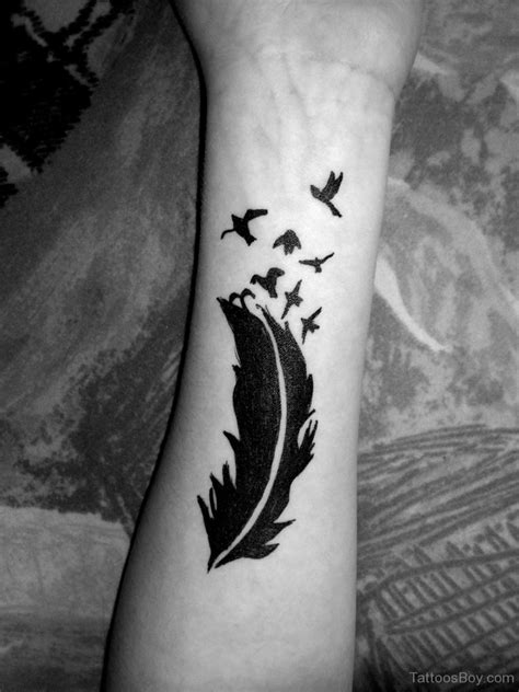 57 Attractive Wrist Feather Tattoos