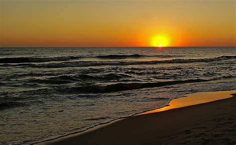 Foto Gratis Tramonto Spiaggia Sole Acqua Alba Mare Oceano Vista
