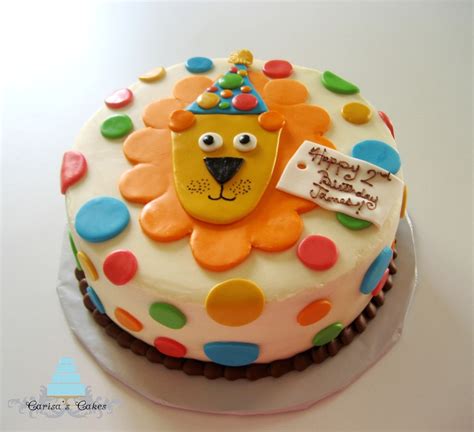 Curious which baby names stole the show this year? First Birthday Lion Cake - CakeCentral.com