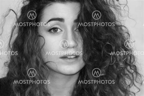 beautiful girl curly haire av kseniia glazkova mostphotos