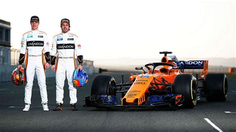 Apparel , sports & shoes. F1: McLaren show true colours as new Formula 1 car is unveiled