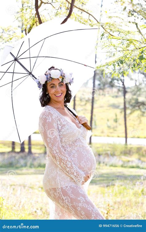 Beautiful Pregnant Woman In White Lace Maternity Dress Outdoors Stock Photo Image Of Grass