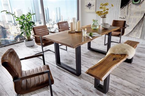 Wooden dining chair is a seating furniture which is made of solid wood to provide a comfortable sitting place for you at your dinner table. Modrest Taylor Modern Live Edge Wood Dining Table