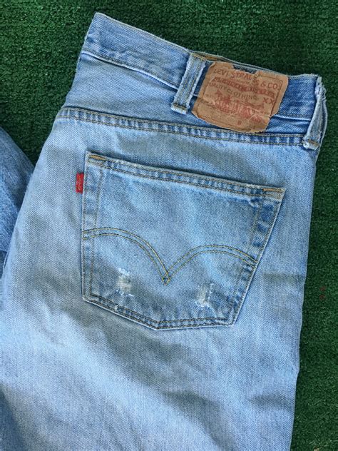 vintage 90s levis 501 grunge blue jeans holes denim nineties 38 x 29 worn in button fly levi s 38