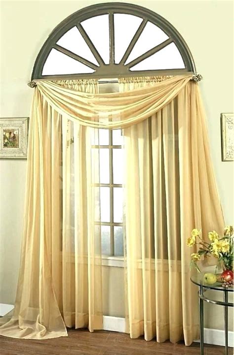 Many people leave the arched area uncovered, but this can be problematic. window covering for arched window window treatments for ...