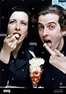 Actor Peter Capaldi eating cream with his actress wife Elaine ...