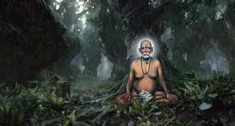 A Man Sitting In The Middle Of A Forest Surrounded By Plants And Trees