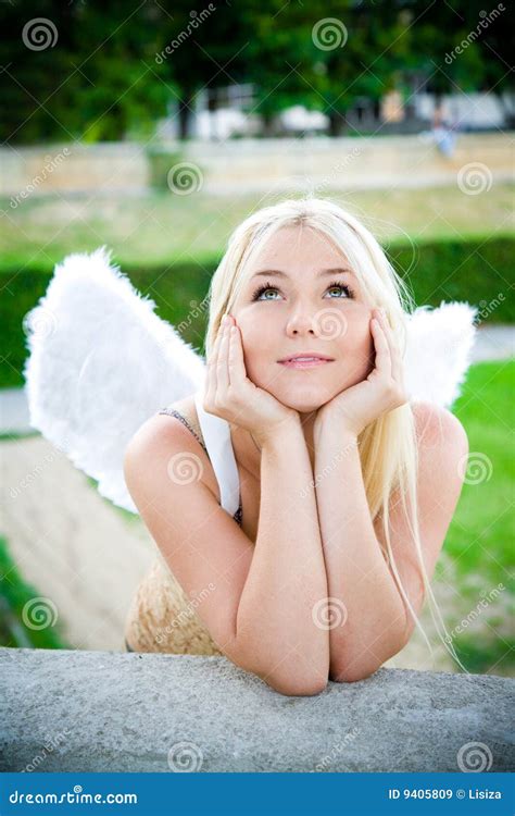 Beautiful Blonde Girl With Angel Wings Royalty Free Stock Images