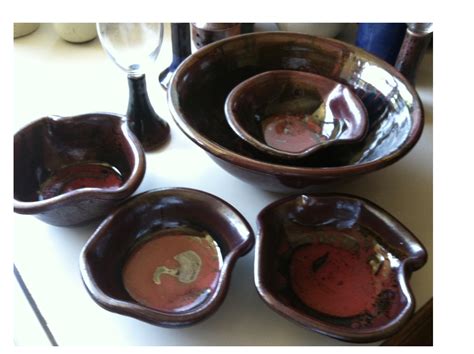 large salad serving bowl with 4 serving bowls in tenmoku and red--my favorite and nice addition ...