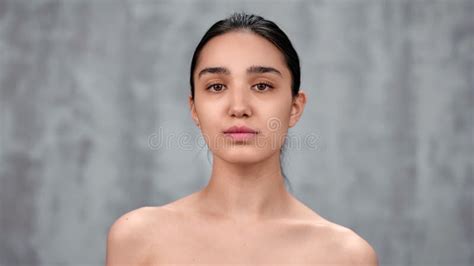 portrait of naked female with natural beauty smiling posing medium close up shot on 4k red