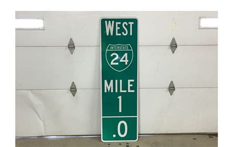 Crews Installing New Mile Marker Signs To Help Drivers With An Emergency