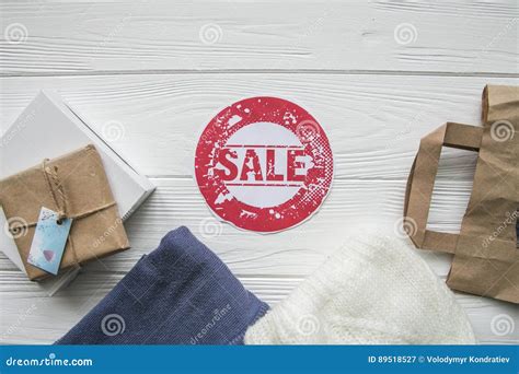 Discount On Items On White Wood Background In Denim Style With Red