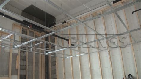 Suspended ceilings are usually built in either a 2×4 or a 2×2 pattern…this pattern is what is called the grid. Drywall Suspended Grid Showroom | Drywall Suspended ...