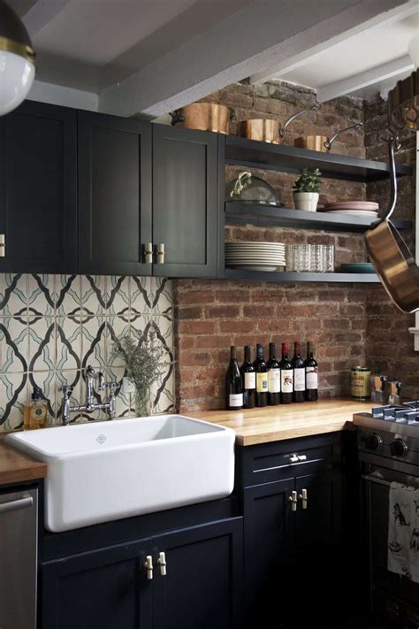 After years of bright, white kitchens being the norm, cabinets and countertops are going dark, she says. Sophisticated And Trendy Black Kitchen Cabinets | Bold ...