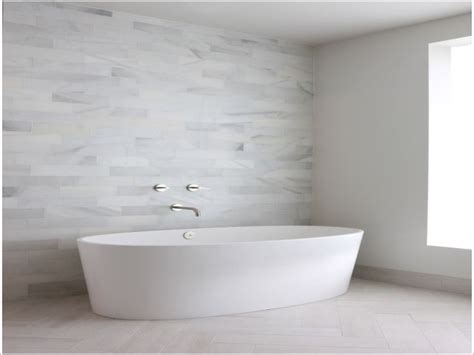 Relaxing soaking tubs easily wash away the stress of the day. wall mounted faucet for freestanding tub | Faucets Ideas ...