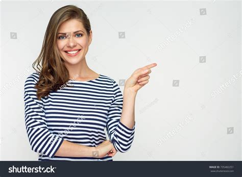 Smiling Woman Pointing Finger Side Isolated Stock Photo Shutterstock