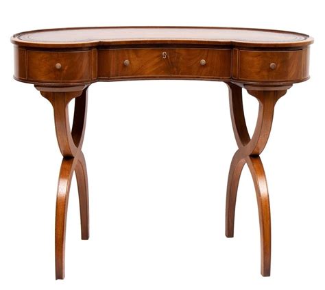They may be made of metal, glass or plastic. Kidney Shaped Writing Table c.1920 in Antique