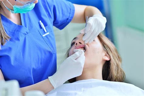 Close Up Of Female With Open Mouth During Oral Checkup At The Dentist Stock Photo Image Of
