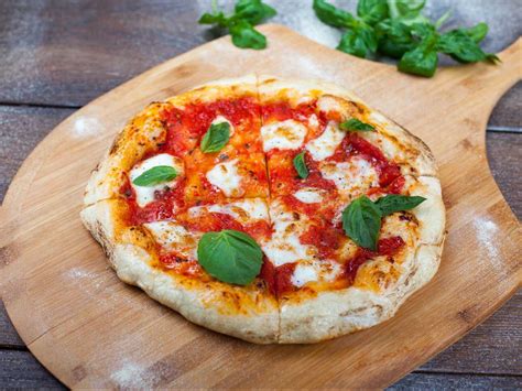 Margherita pizza is a classic pizza recipe that is both beautiful and extremely. Gusto Worldwide Media - Margherita Pizza