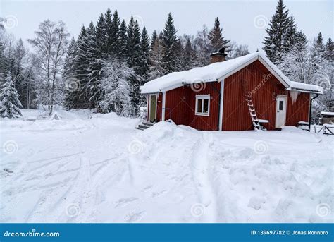 Red Cabin Covered In Snow In Sweden Stock Photo Image Of Alone Snow