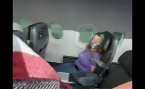 Watch Passenger Duct Taped To Seat After Trying To Flee Plane Mid Flight Travel Weekly
