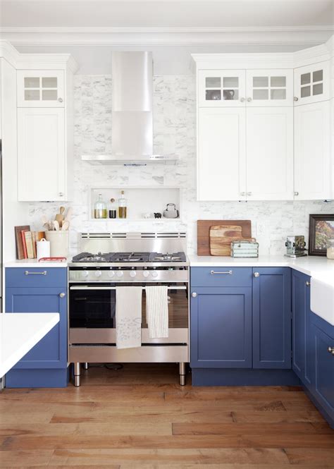 Get ideas from a variety of small kitchen designs and layouts utilizing different types of white cabinetry. Two Toned Kitchen Cabinet Trend