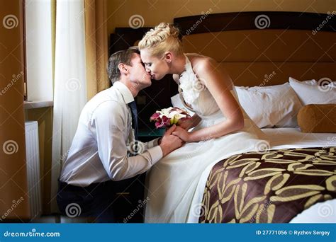 Romantic Kiss Bride And Groom In Bedroom Royalty Free Stock Image Image 27771056