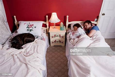 Couple Sleeping In Separate Beds Photos And Premium High Res Pictures Getty Images