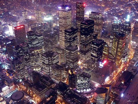 Online Crop Aerial Photography Of City Buildings During Night Time Hd