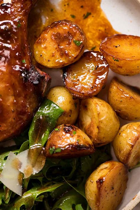 Rub each pork chop with olive oil. Oven Baked Pork Chops with Potatoes | RecipeTin Eats