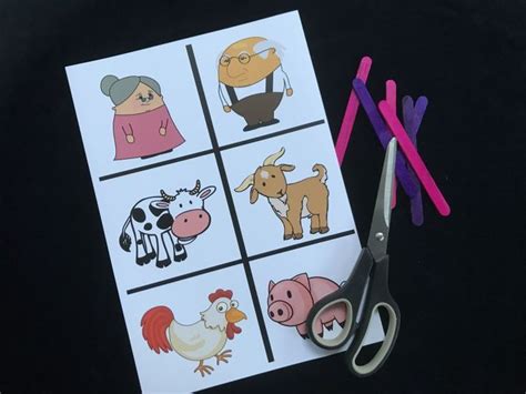 Scissors And Stickers With Pictures Of Farm Animals On Them